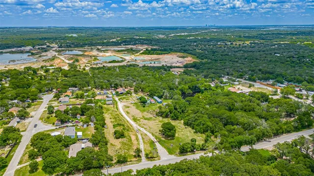 a view of a swimming pool and a yard