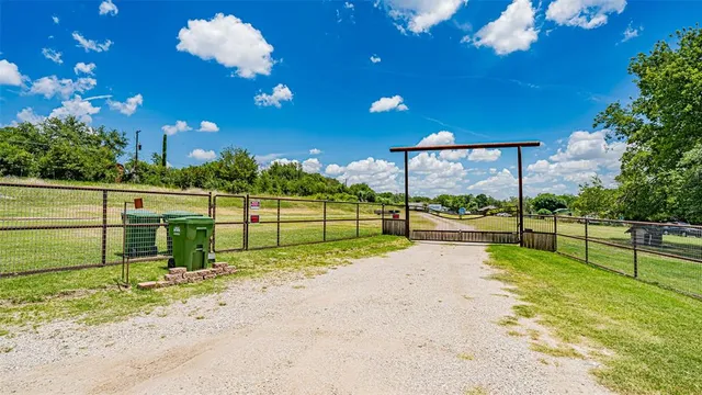 a view of a golf course with a swimming pool