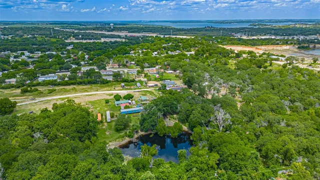 a view of a lake with a city
