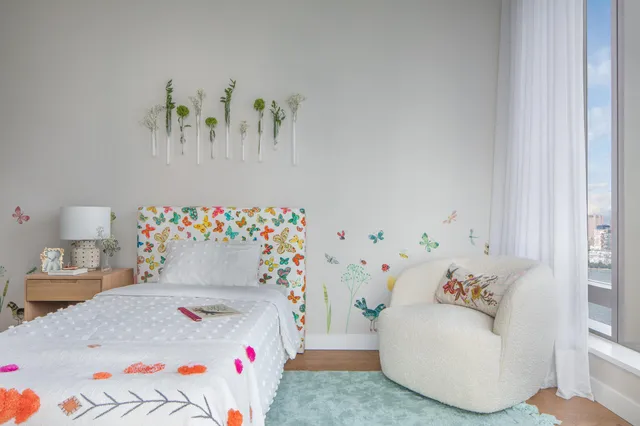 a bedroom with furniture and a bed