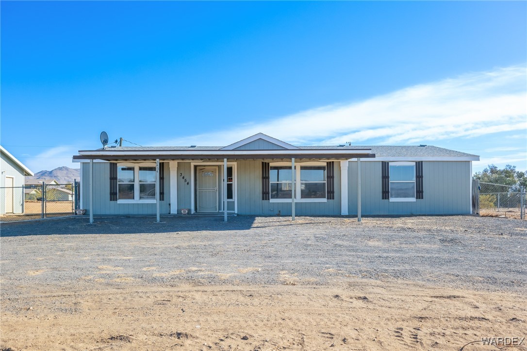 3454 Maverick Road Golden Valley, AZ 86413 - Photo 1 of 18 front view of a house