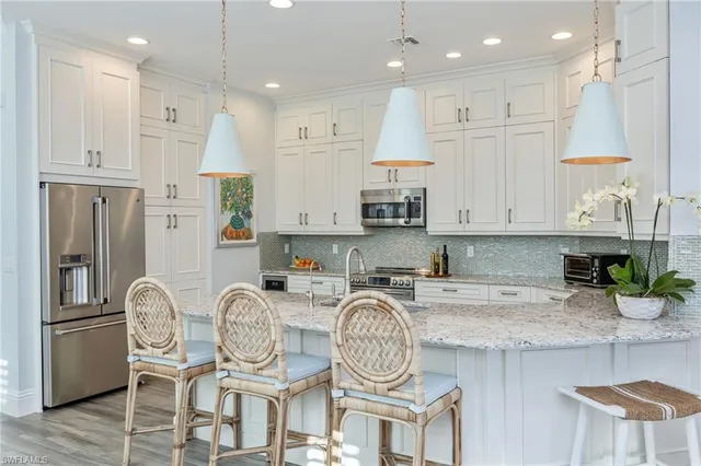 $985,000 | 5672 Highbourne Drive, Naples, FL 34113