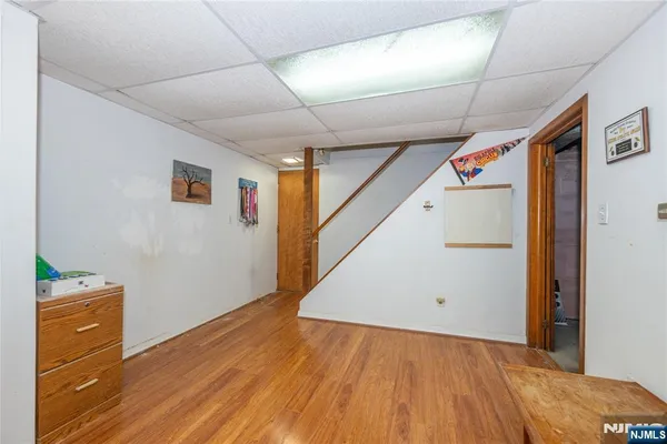 a workspace with furniture and wooden floor