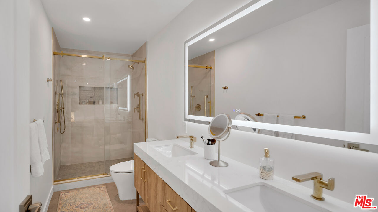 8601 Falmouth Avenue, Unit 224 Playa del Rey, CA 90293 - Photo 18 of 41 a bathroom with a sink and a mirror
