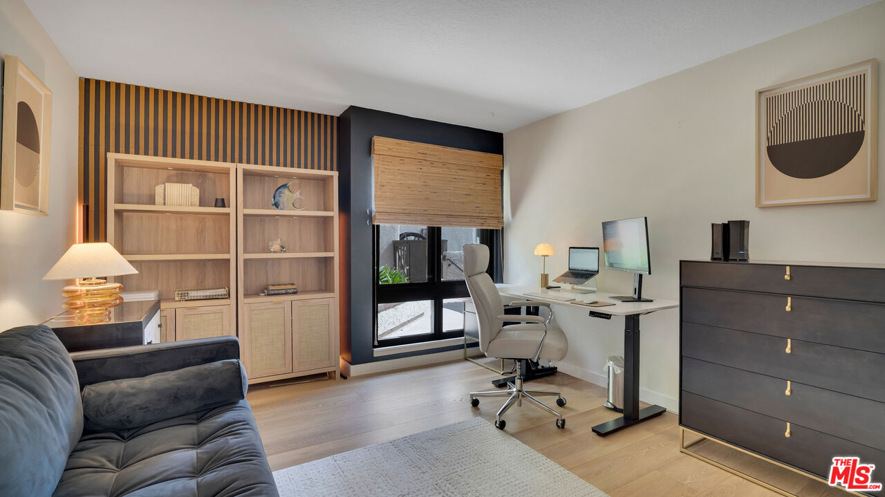8601 Falmouth Avenue, Unit 224 Playa del Rey, CA 90293 - Photo 20 of 41 a livingroom with workspace and a window