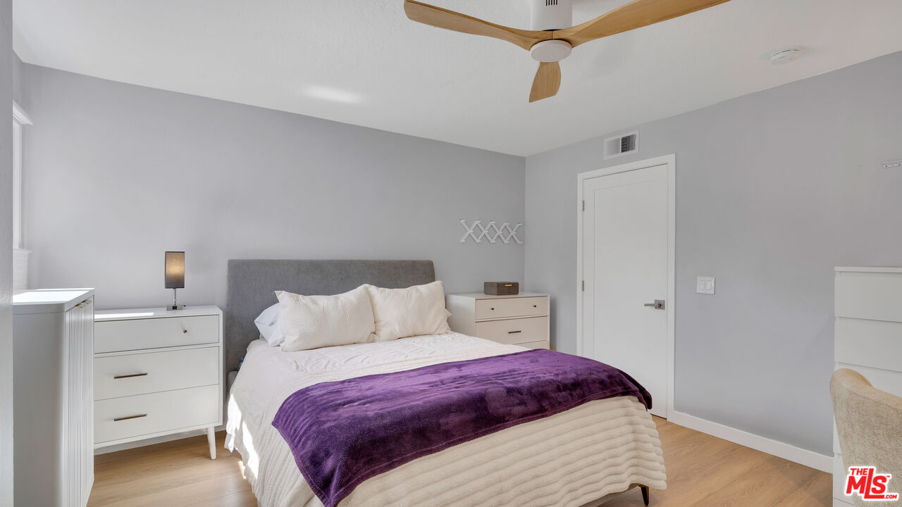 8601 Falmouth Avenue, Unit 224 Playa del Rey, CA 90293 - Photo 25 of 41 a bedroom with a bed and a dresser