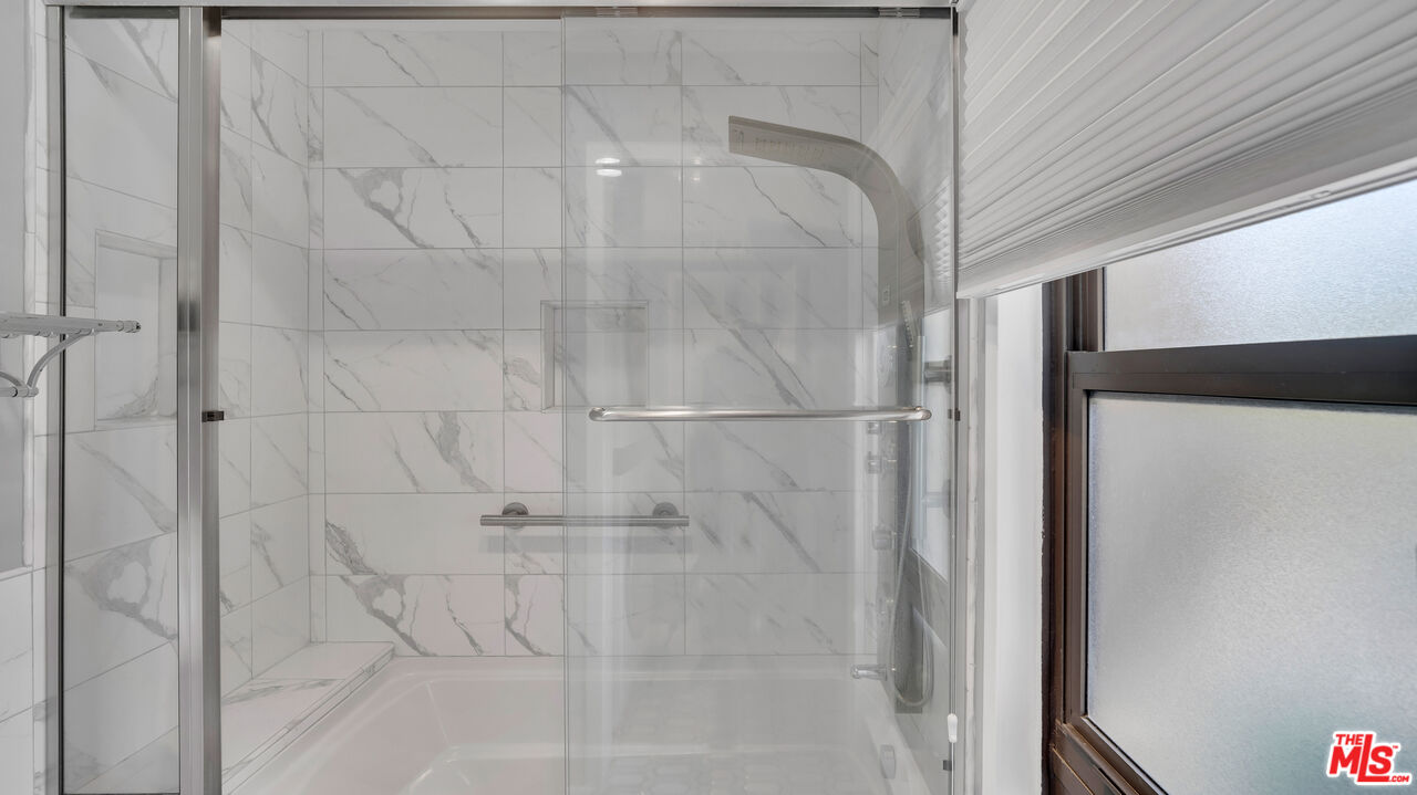 8601 Falmouth Avenue, Unit 224 Playa del Rey, CA 90293 - Photo 28 of 41 a bathroom with a shower