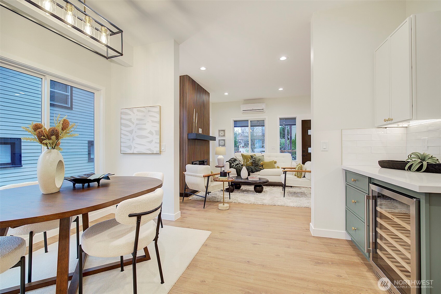 7008 Linden Avenue North Seattle, WA 98103 - Photo 11 of 39 a living room with furniture and wooden floor