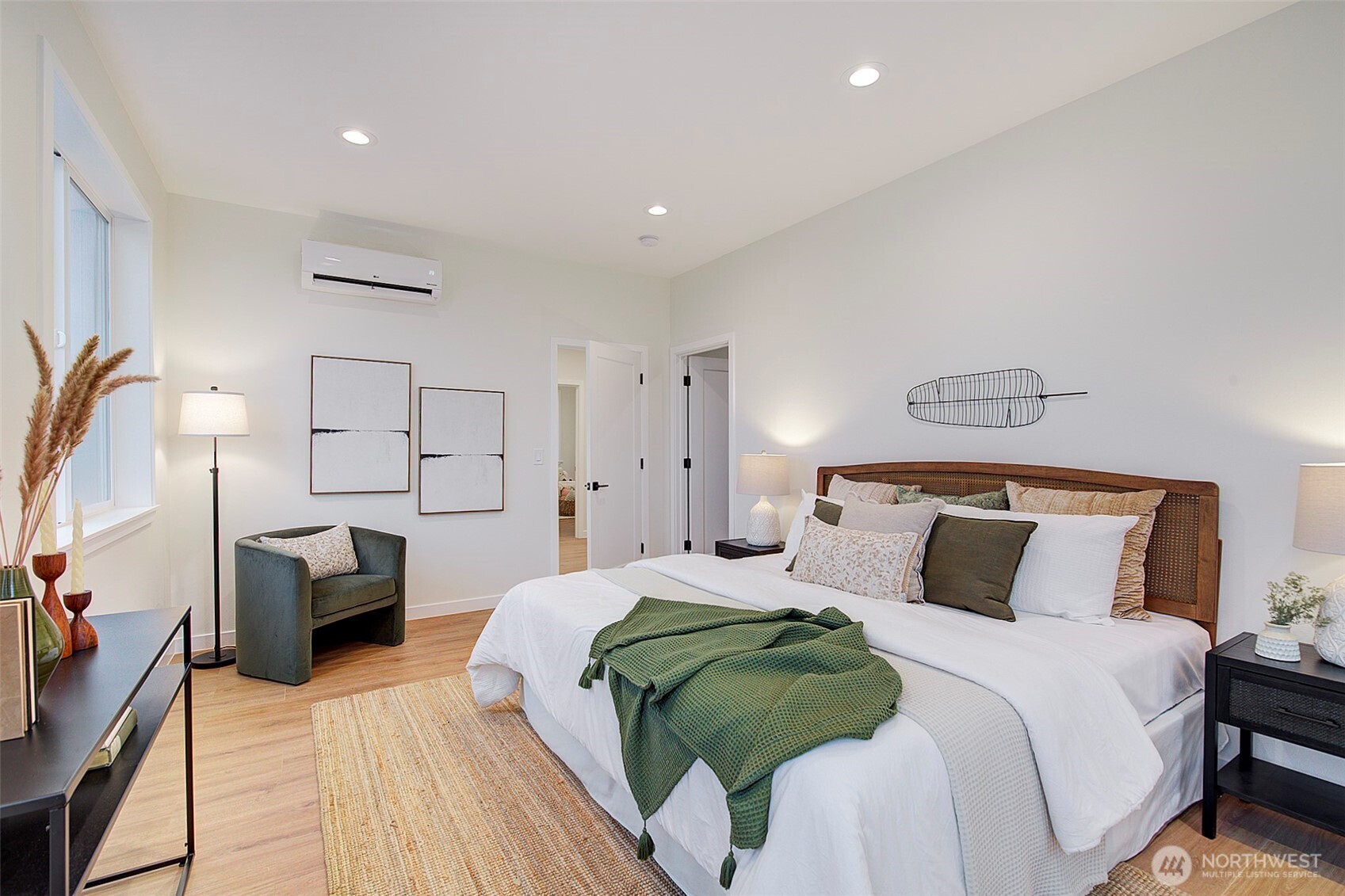 7008 Linden Avenue North Seattle, WA 98103 - Photo 12 of 39 a bedroom with a bed and a couch