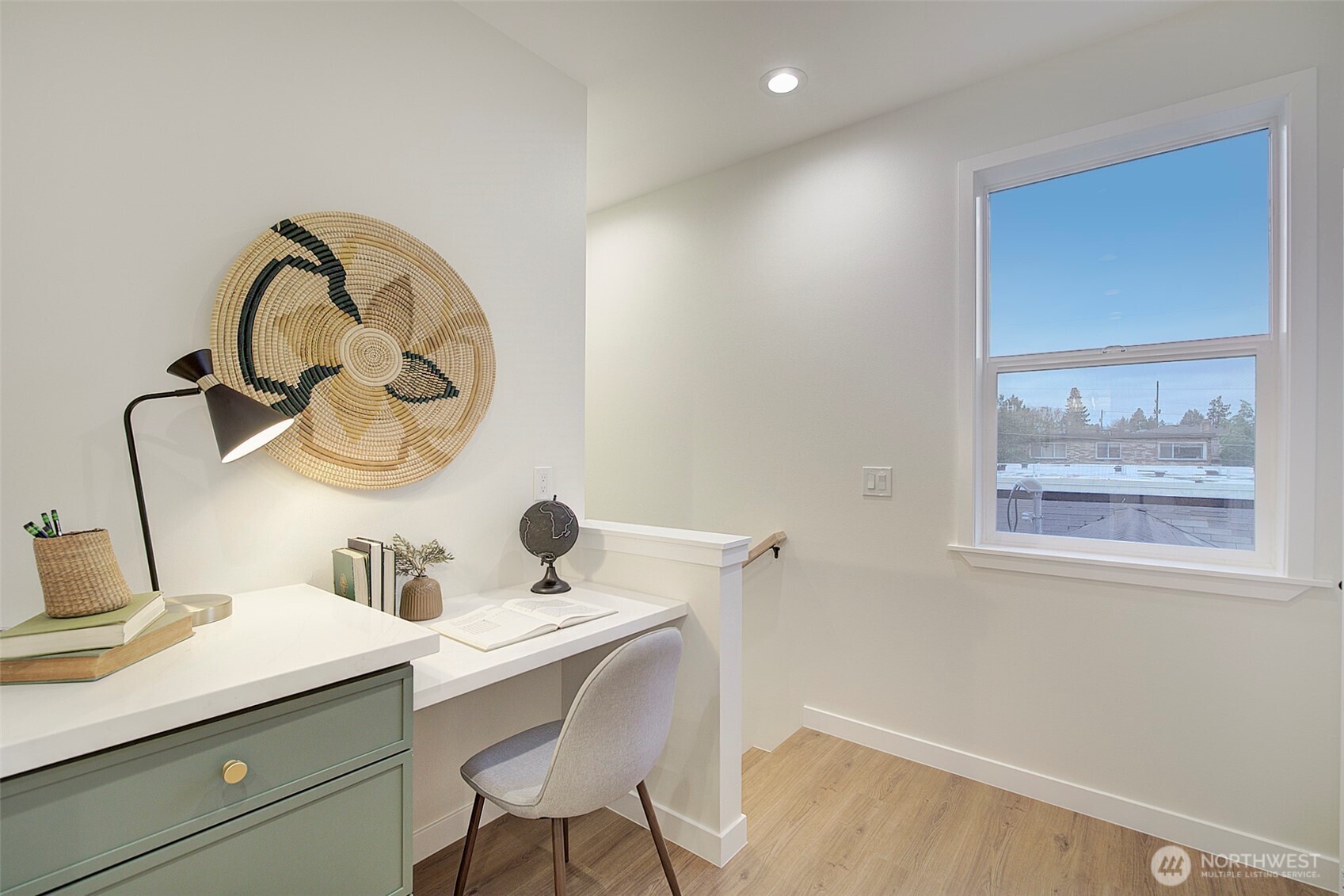 7008 Linden Avenue North Seattle, WA 98103 - Photo 23 of 39 a bathroom with a sink and a mirror