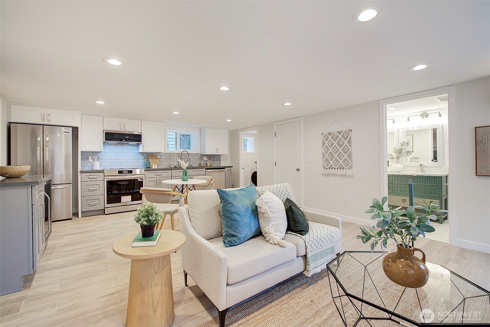7008 Linden Avenue North Seattle, WA 98103 - Photo 30 of 39 a living room with furniture kitchen and a table