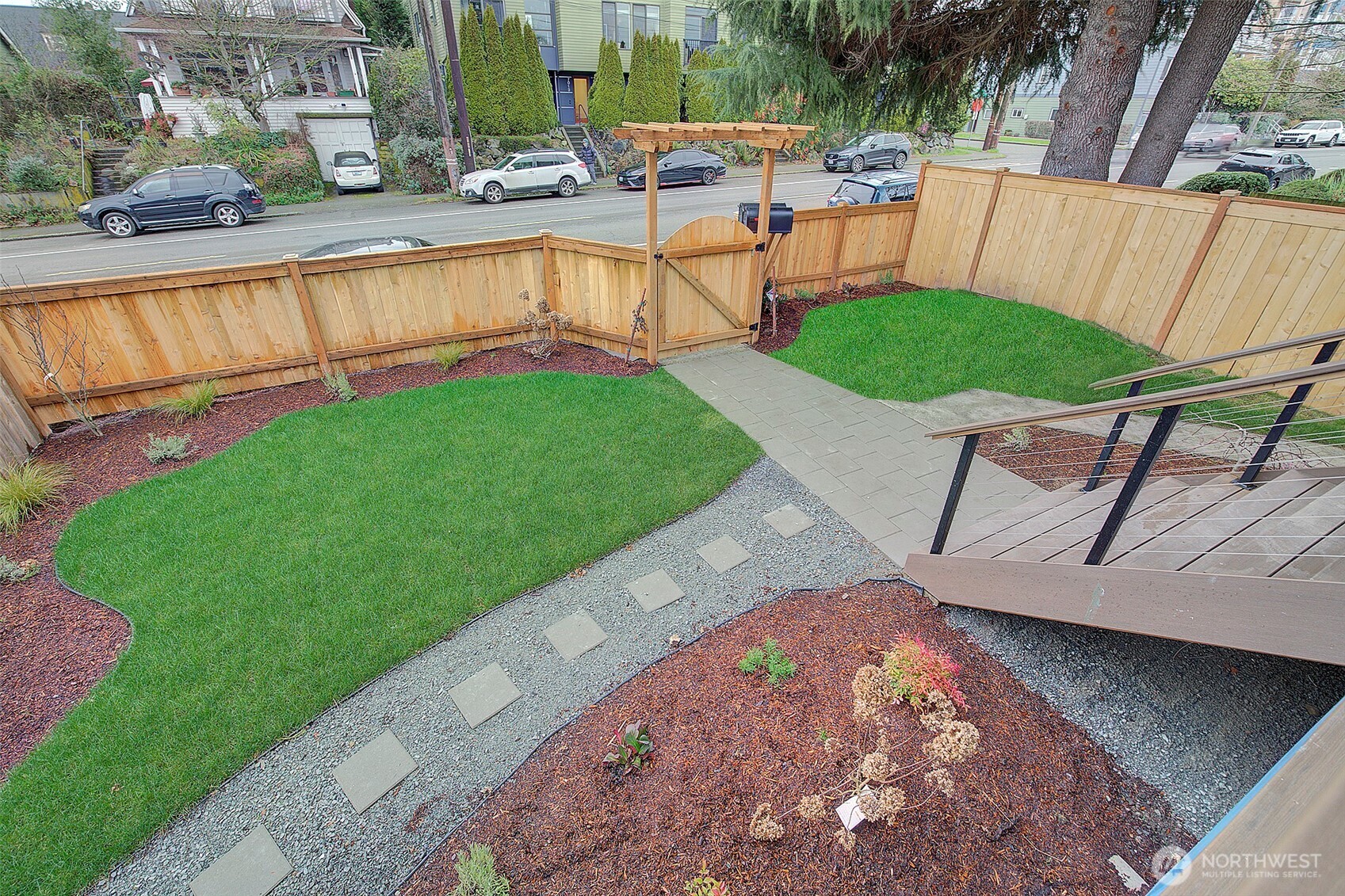7008 Linden Avenue North Seattle, WA 98103 - Photo 37 of 39 a view of a backyard with sitting area