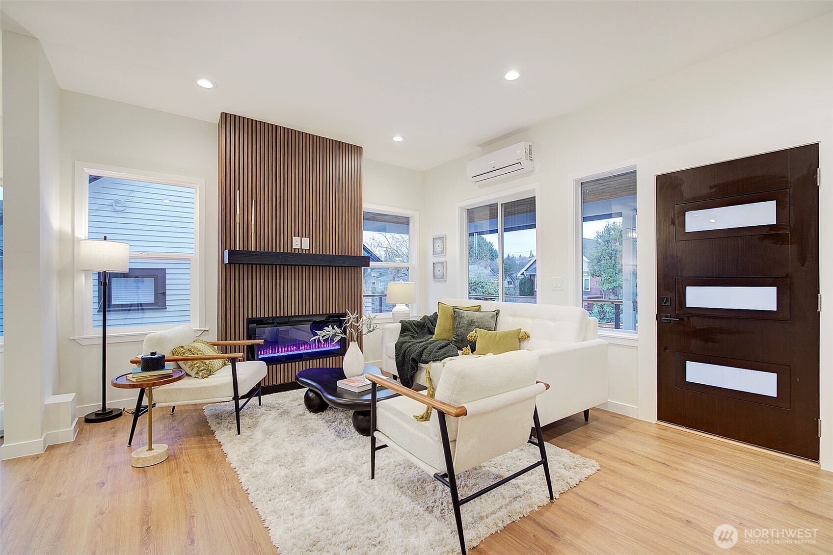 7008 Linden Avenue North Seattle, WA 98103 - Photo 4 of 39 a living room with furniture and wooden floor