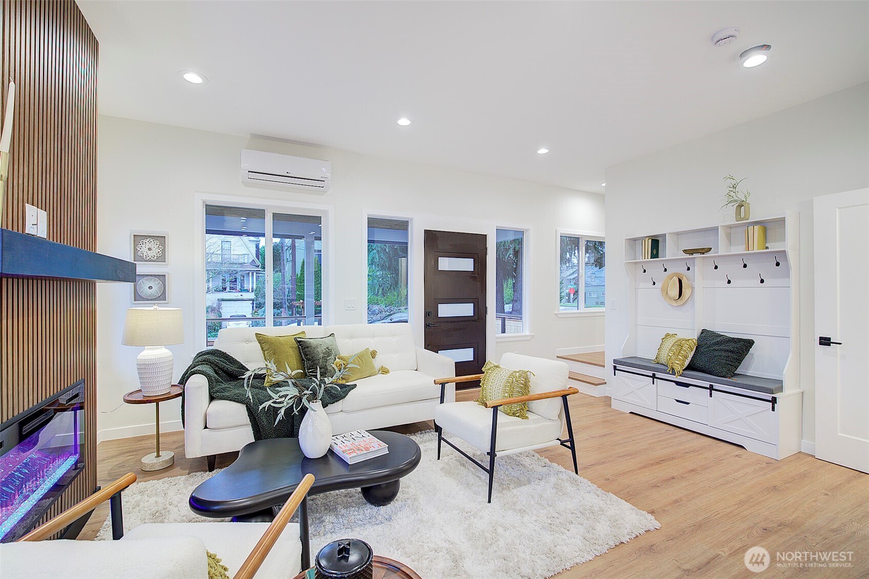 7008 Linden Avenue North Seattle, WA 98103 - Photo 5 of 39 a living room with furniture and a flat screen tv