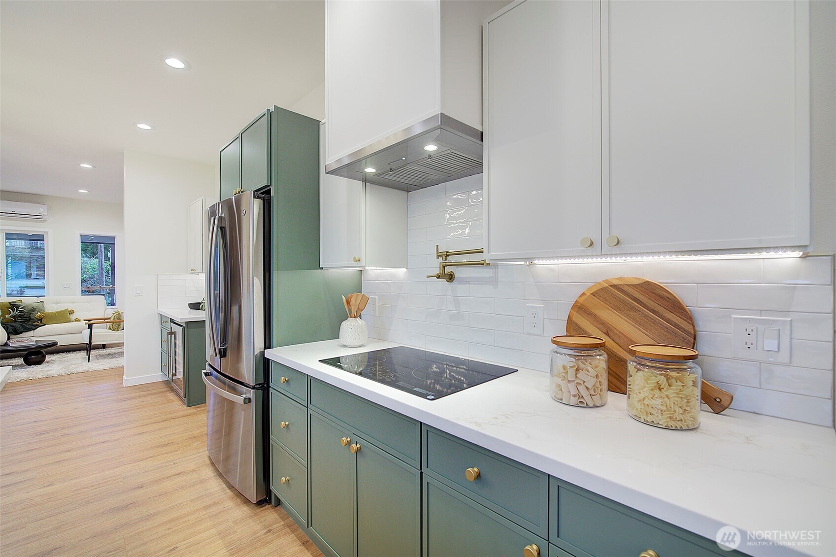 7008 Linden Avenue North Seattle, WA 98103 - Photo 8 of 39 a kitchen with refrigerator and cabinets