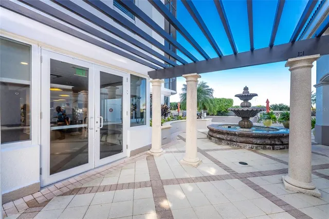 a view of a swimming pool with a lounge chairs