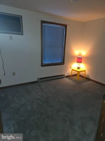 a car parked in front of a room