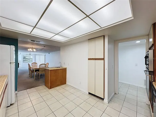 a view of a room with windows