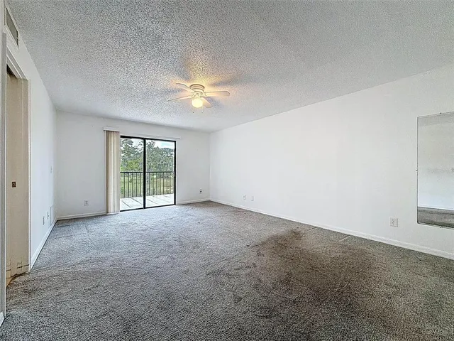 a view of a balcony with wooden floor