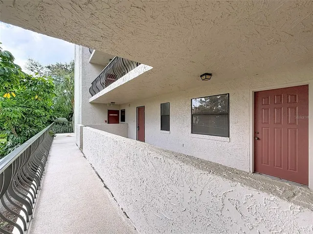 a kitchen with stainless steel appliances a sink and a refrigerator