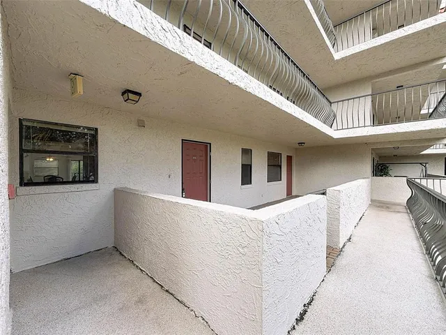 a kitchen with a sink a counter top space and appliances