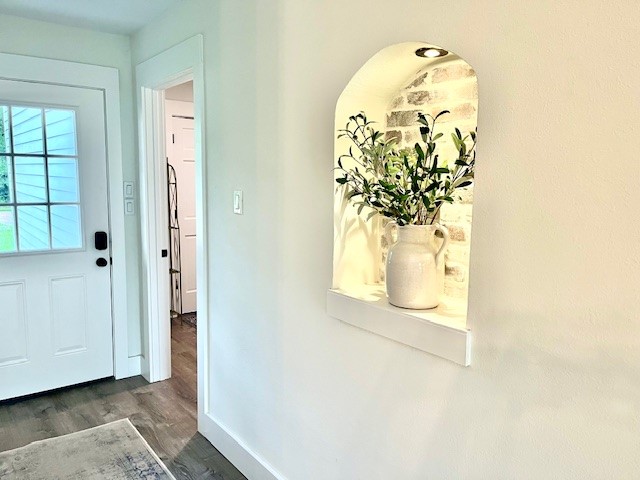 169 Timber Mill Street The Woodlands, TX 77380 - Photo 4 of 23 a view of a chandelier in a hallway