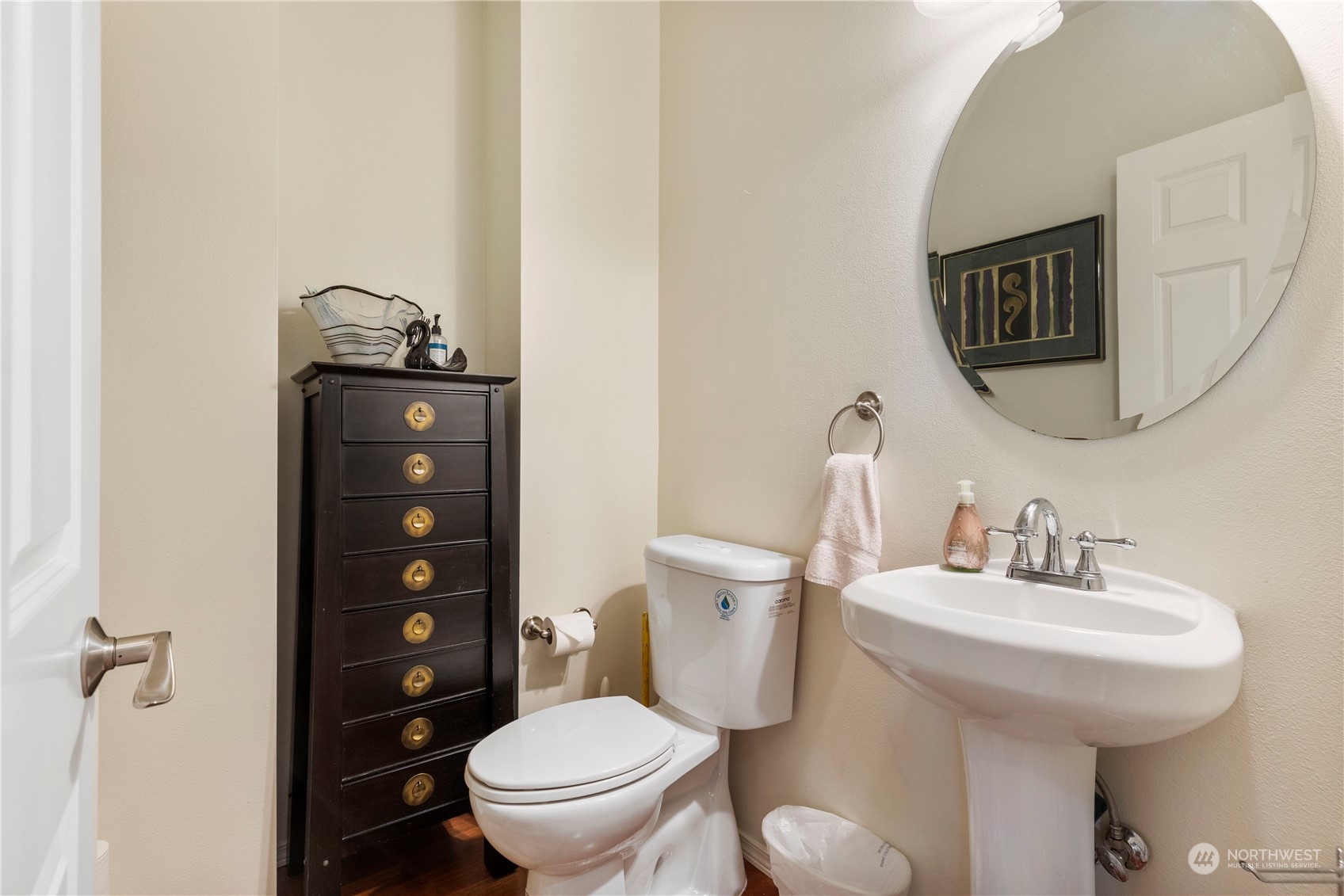 1768 Monroe Avenue Northeast Renton, WA 98056 - Photo 18 of 37 a bathroom with a toilet sink and mirror
