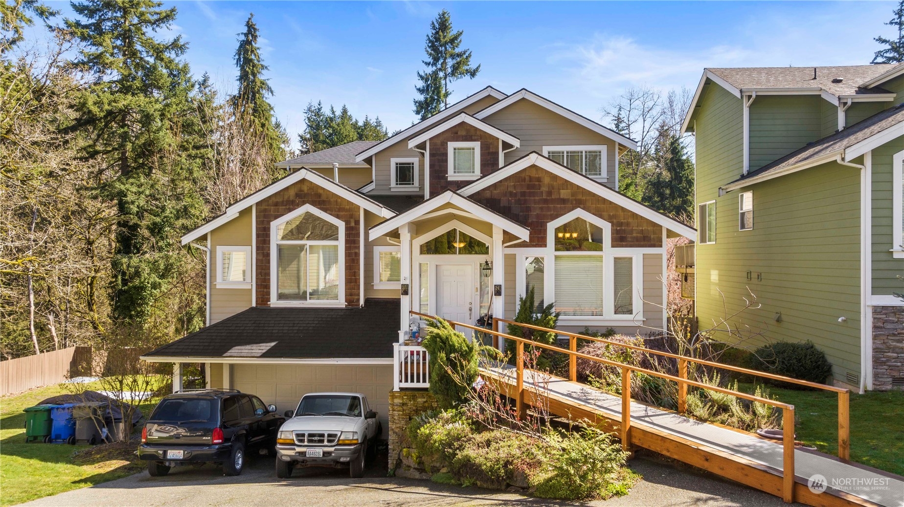 1768 Monroe Avenue Northeast Renton, WA 98056 - Photo 2 of 37 a view of a car park in front of house