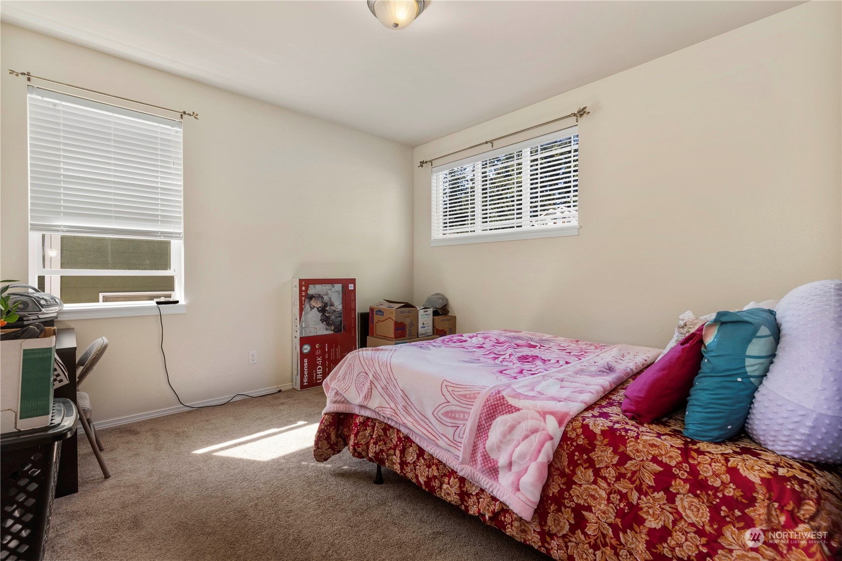 1768 Monroe Avenue Northeast Renton, WA 98056 - Photo 23 of 37 a bedroom with a bed and a window