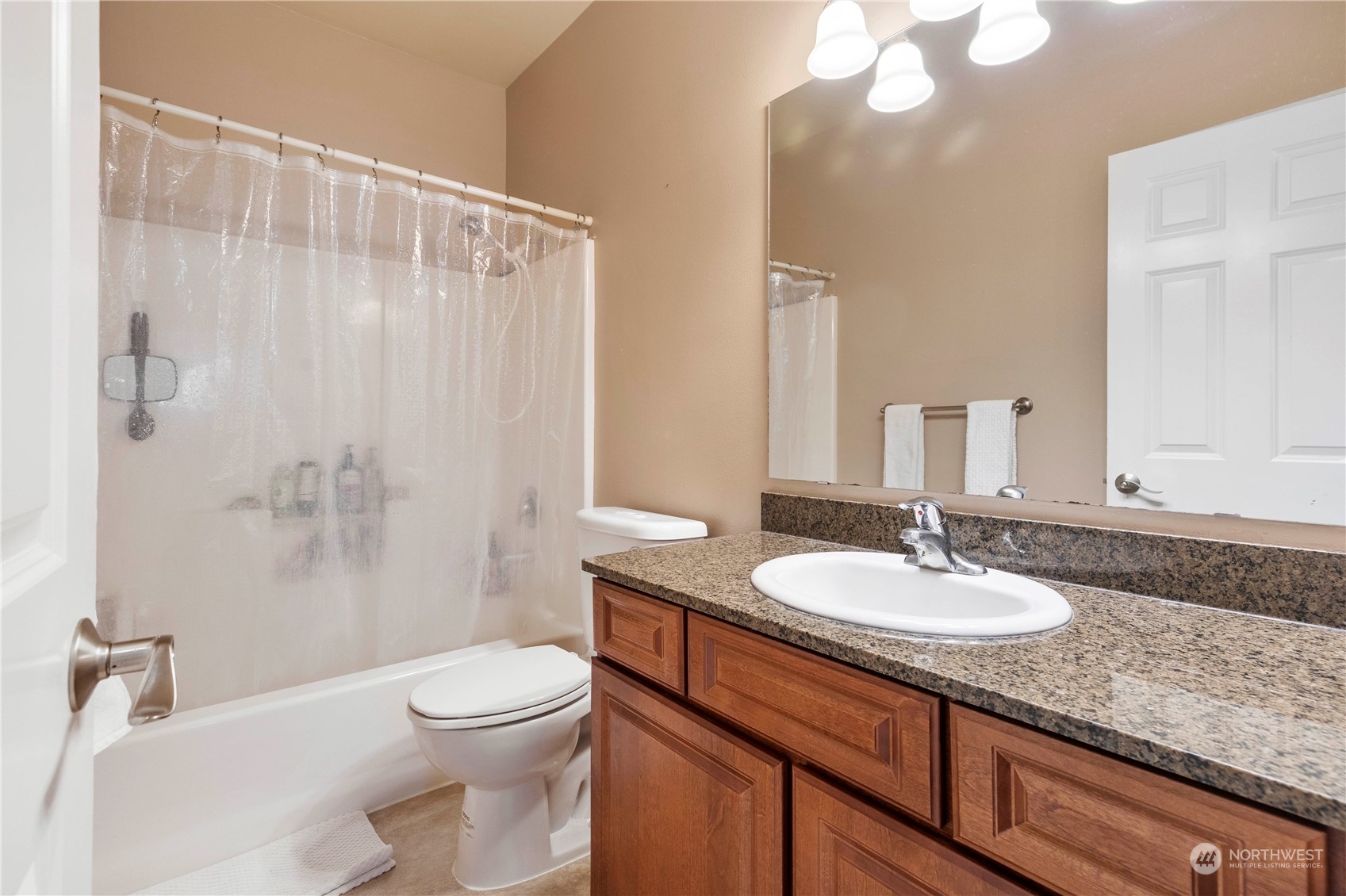 1768 Monroe Avenue Northeast Renton, WA 98056 - Photo 25 of 37 a bathroom with a sink a toilet and shower