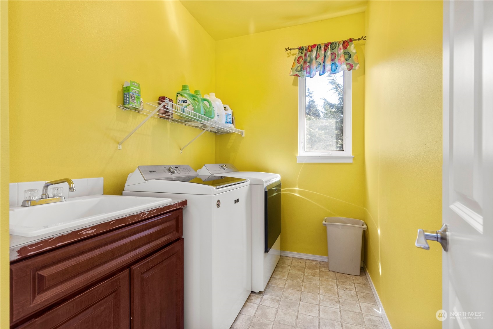 1768 Monroe Avenue Northeast Renton, WA 98056 - Photo 27 of 37 a view of a bathroom with a sink