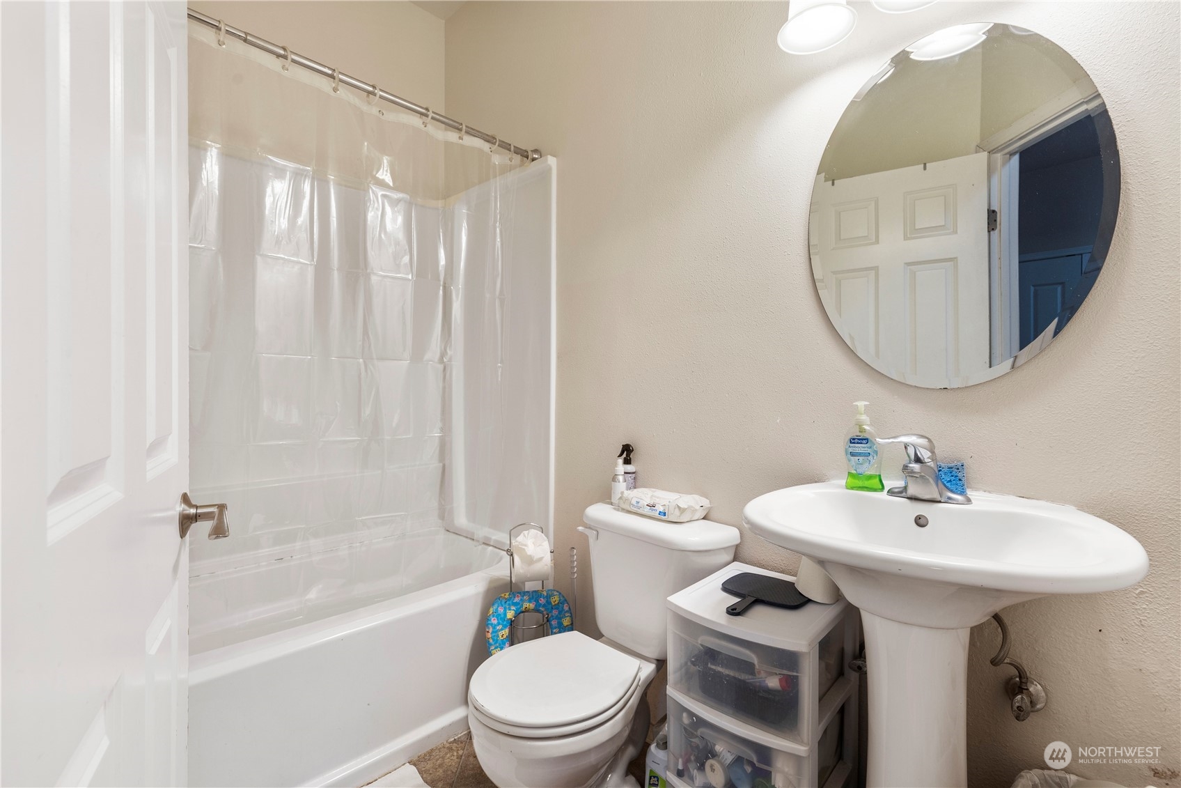 1768 Monroe Avenue Northeast Renton, WA 98056 - Photo 30 of 37 a bathroom with a sink toilet and bathtub
