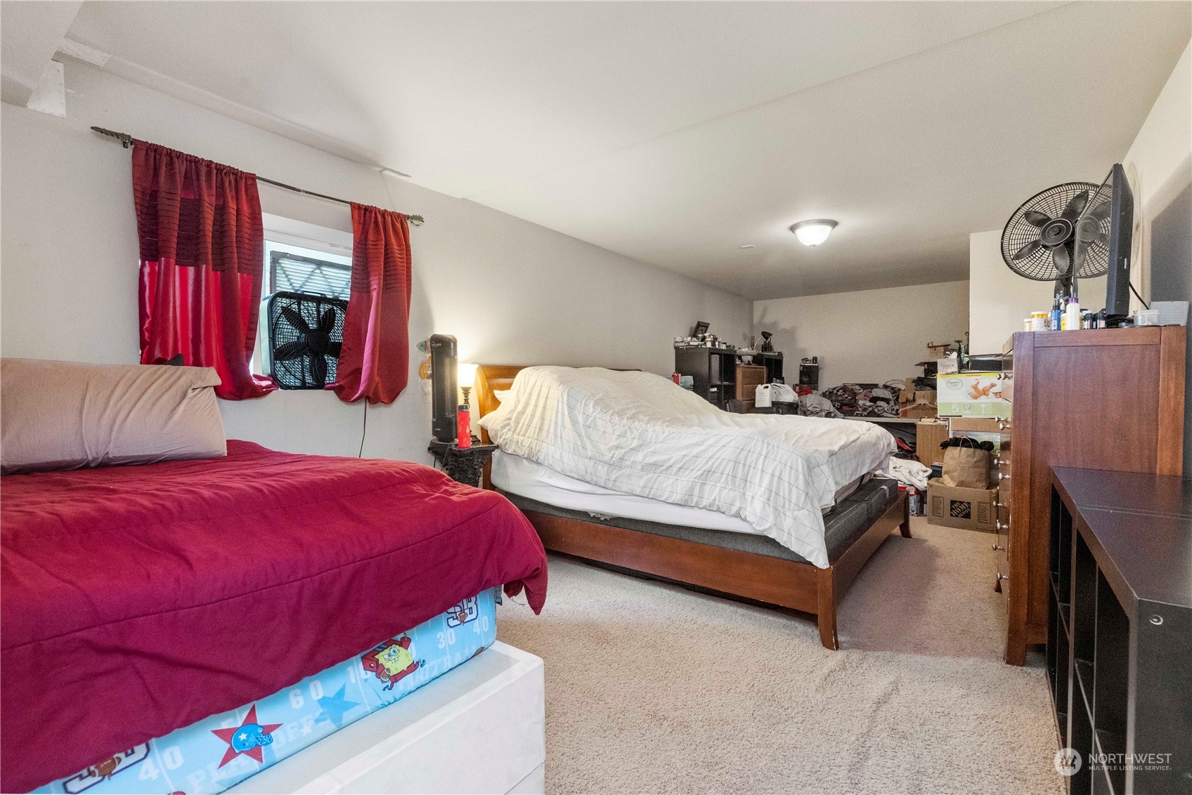 1768 Monroe Avenue Northeast Renton, WA 98056 - Photo 33 of 37 a bedroom with bed and window