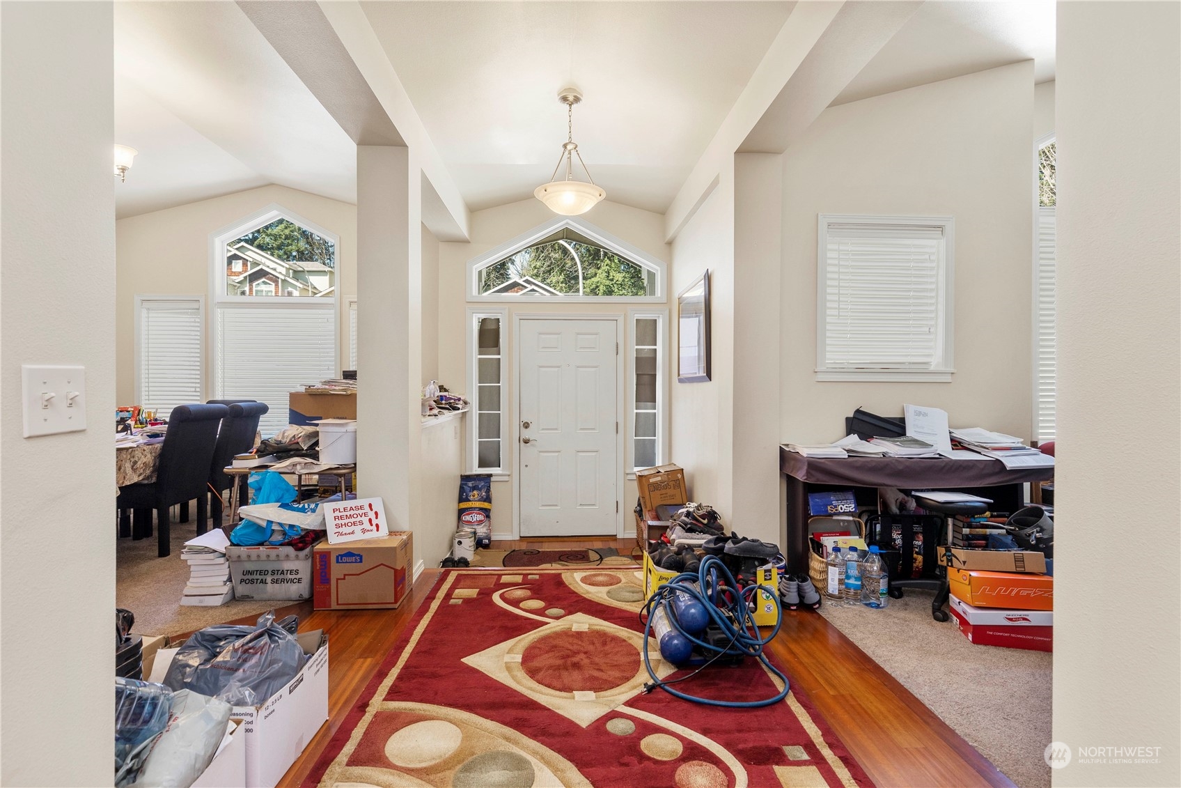 1768 Monroe Avenue Northeast Renton, WA 98056 - Photo 7 of 37 a room with furniture and a chandelier