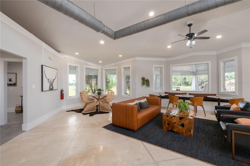 46 Southwest 125th Circle Archer, FL 32618 - Photo 10 of 12 a living room with furniture and a large window