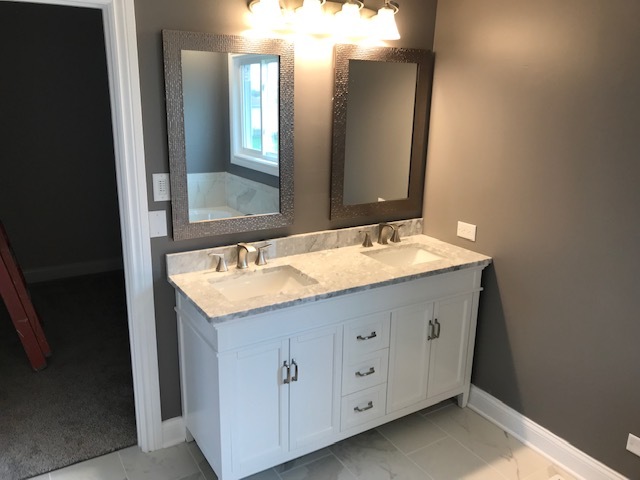 125 Red Barn Road Matteson, IL 60443 - Photo 11 of 14 a bathroom with a granite countertop sink and a mirror