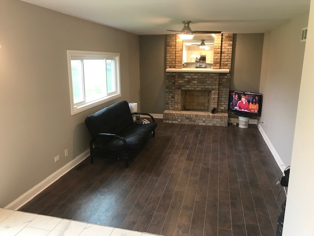 125 Red Barn Road Matteson, IL 60443 - Photo 5 of 14 a living room with furniture and a fireplace