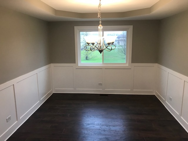 125 Red Barn Road Matteson, IL 60443 - Photo 8 of 14 an empty room with wooden floor and windows