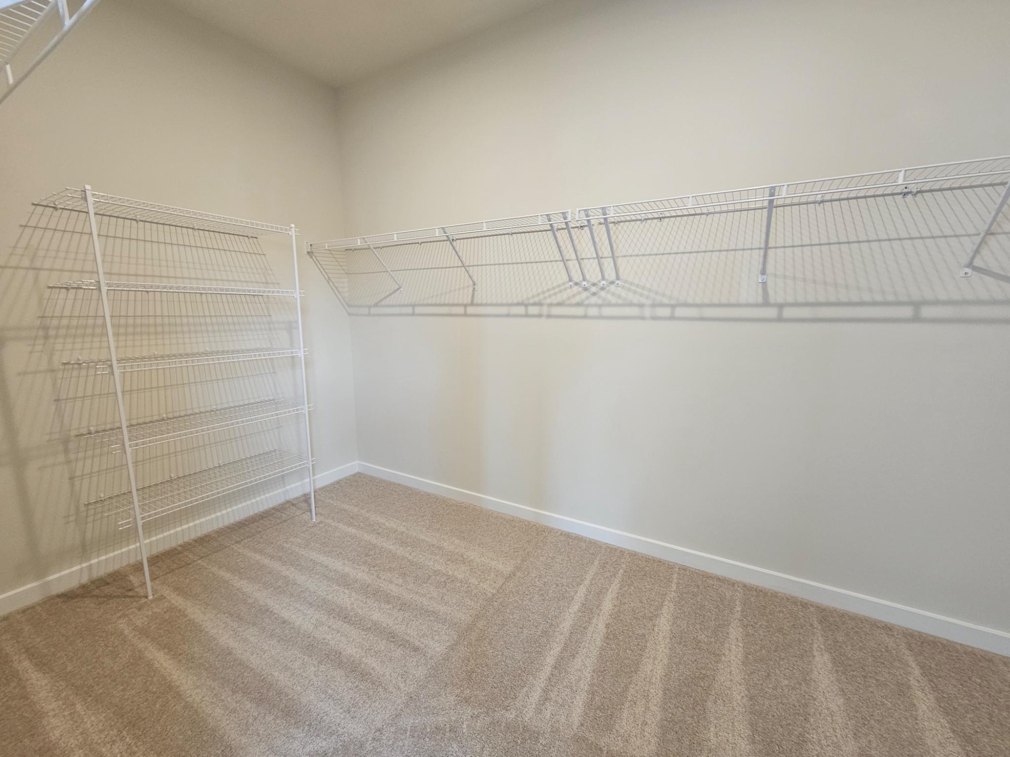 13721 Cobble Loop Woodbridge, VA 22193 - Photo 14 of 27 Gigantic walk in closet in primary bedroom.