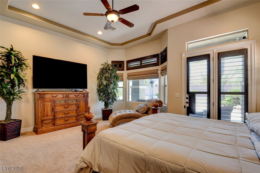 8465 West Picket Ridge Court Las Vegas, NV 89143 - Photo 20 of 51 Oversized primary bedroom featuring a cozy area under a bay window