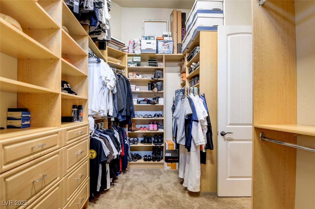 8465 West Picket Ridge Court Las Vegas, NV 89143 - Photo 25 of 51 Large custom closet with built-in cabinets extending to the ceiling