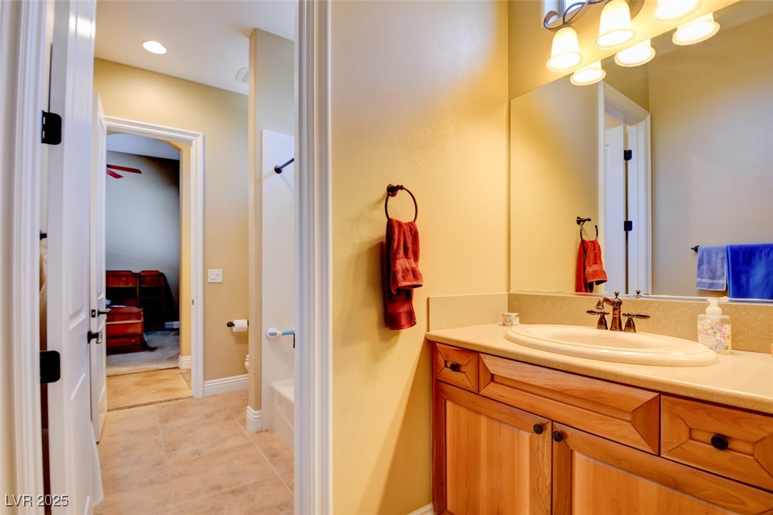 8465 West Picket Ridge Court Las Vegas, NV 89143 - Photo 31 of 51 Jack and Jill Bathroom with Dual Sinks