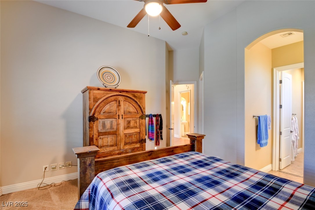 8465 West Picket Ridge Court Las Vegas, NV 89143 - Photo 34 of 51 Spacious bedroom with direct access to the shared Jack and Jill ensuite bathroom