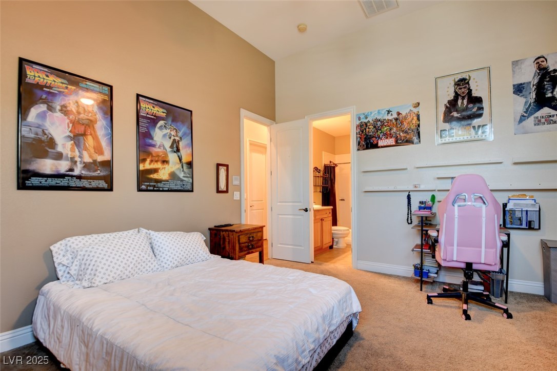 8465 West Picket Ridge Court Las Vegas, NV 89143 - Photo 36 of 51 nother bedroom featuring its own private ensuite full-bathroom