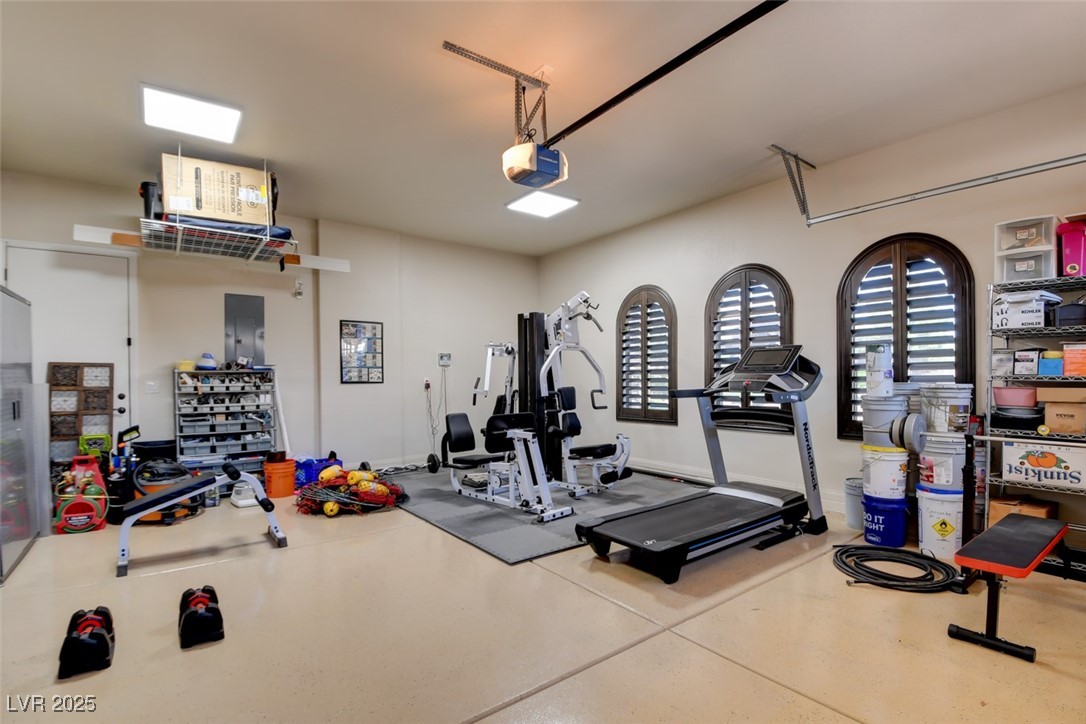 8465 West Picket Ridge Court Las Vegas, NV 89143 - Photo 41 of 51 Additional 2-car garage with side entry, epoxy floors, overhead storage, custom shutters and finished walls