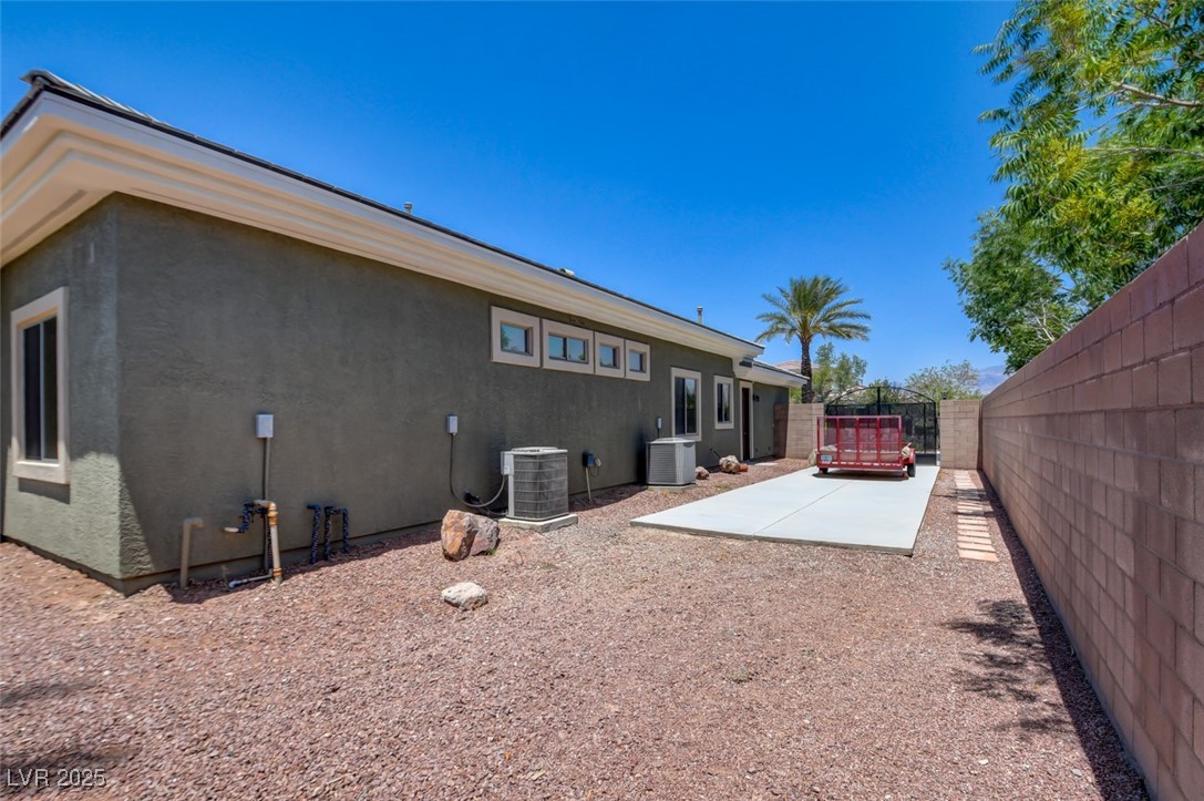 8465 West Picket Ridge Court Las Vegas, NV 89143 - Photo 50 of 51 Spacious concrete pad with RV cleanout – functional and ready for use