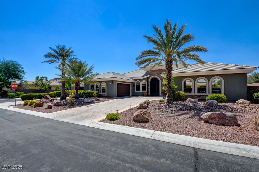 8465 West Picket Ridge Court Las Vegas, NV 89143 - Photo 5 of 51 Beautiful Curb Appeal Framed by Mature Palms