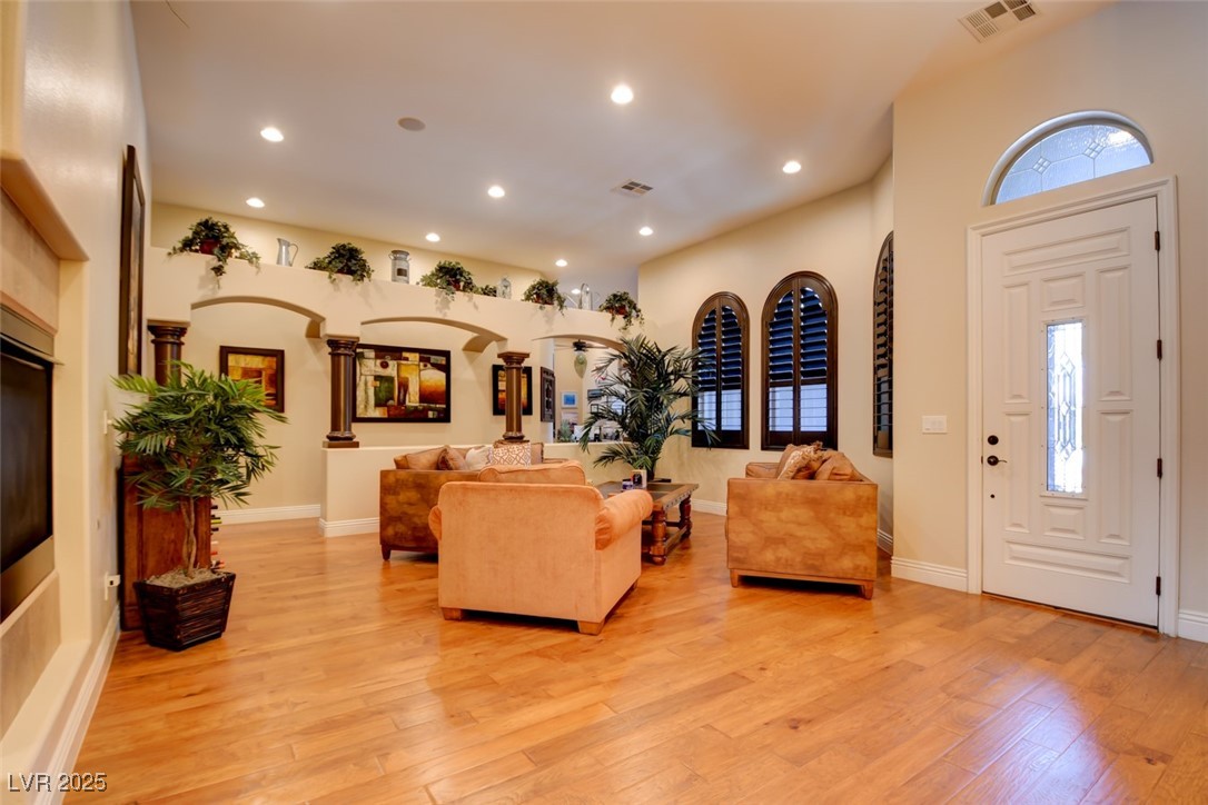8465 West Picket Ridge Court Las Vegas, NV 89143 - Photo 6 of 51 Impressive Entryway Leading to Expansive Living Room