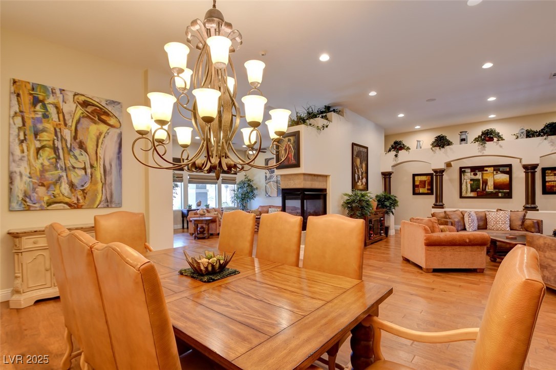 8465 West Picket Ridge Court Las Vegas, NV 89143 - Photo 9 of 51 Generous Dining Room with Seamless Flow and Lots of Light