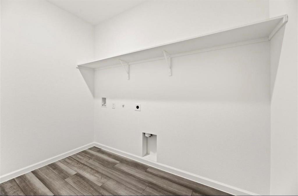 10308 Holy Cross Lane Crowley, TX 76036 - Photo 8 of 27 a view of a small space with wooden floor